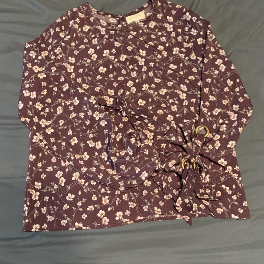 Purple flowered blouse